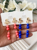 Pendiente Aretes colgantes vintage con flor dorada y cuentas rojas pen699