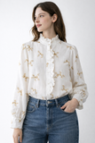 Blusa blanca bordada de manga larga con cuello fruncido 3025-BE