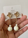 Pendientes largos de flor con bola -echo mano PEN699