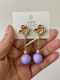 Pendientes largos de flor con bola -echo mano PEN699