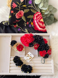 Conjunto negro y rojo de flamencas