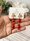Pendiente Aretes colgantes vintage con flor dorada y cuentas rojas pen699