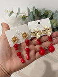 Aretes colgantes vintage con flor dorada y cuentas rojas pen899