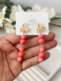 Pendiente Aretes colgantes vintage con flor dorada y cuentas rojas pen699