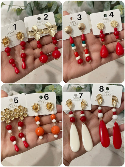 Aretes colgantes vintage con flor dorada y cuentas rojas pen899